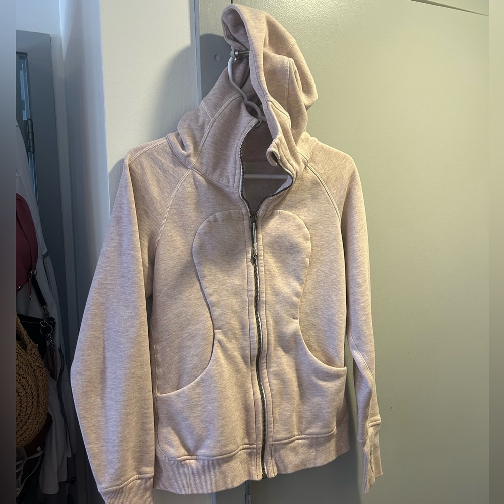 Light pink Lululemon zip hoodie